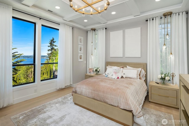 17281 SE 43rd St, Bellevue, WA 98006 - bedroom featuring coffered ceiling, a water view, light wood-style floors, a chandelier, and beamed ceiling