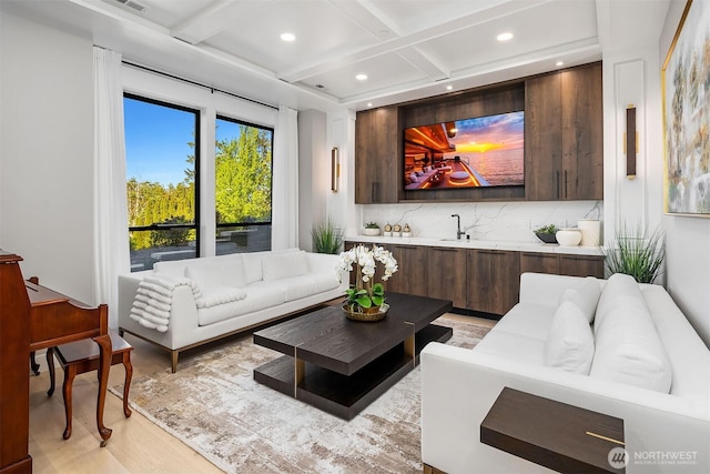 17281 SE 43rd St, Bellevue, WA 98006 - living room with coffered ceiling, light wood-style floors, recessed lighting, beam ceiling, and wet bar