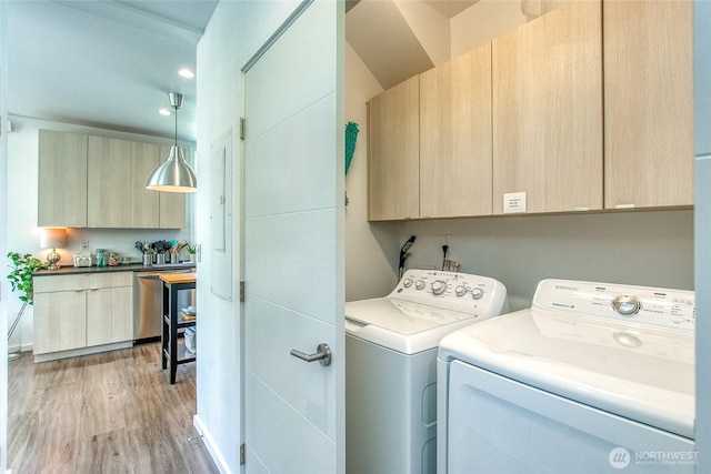 430 Prune Aly Unit B, Orcas Island, WA 98245 - laundry area with independent washer and dryer, light wood-style flooring, cabinet space, and recessed lighting