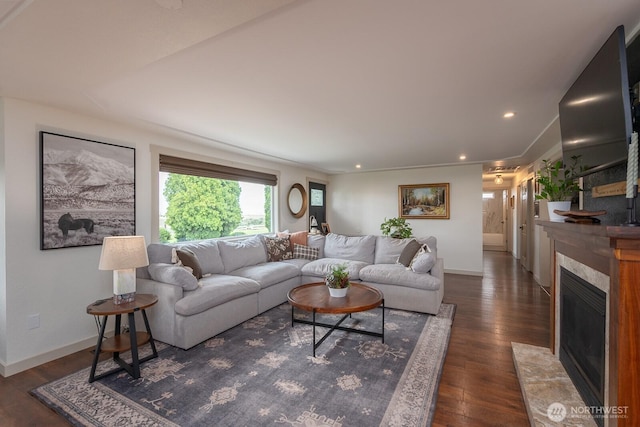 12009 NW Dodson Rd, Ephrata, WA 98823 - living area featuring wood finished floors, baseboards, a premium fireplace, and recessed lighting