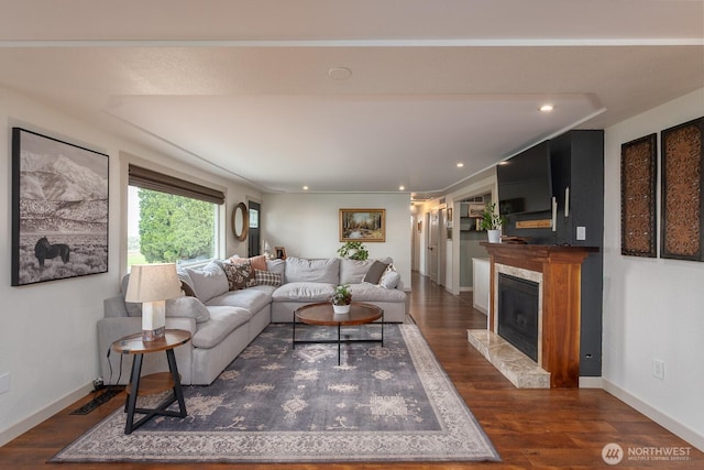 12009 NW Dodson Rd, Ephrata, WA 98823 - living room featuring wood finished floors, a premium fireplace, recessed lighting, and baseboards