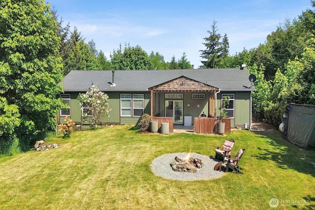 1055 Falls Dr, Bellingham, WA 98229 - rear view of house featuring an outdoor fire pit and a yard