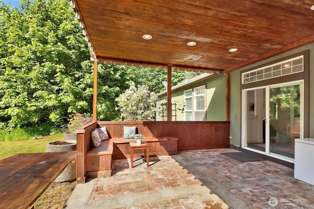 1055 Falls Dr, Bellingham, WA 98229 - view of patio with an outdoor living space with a fire pit