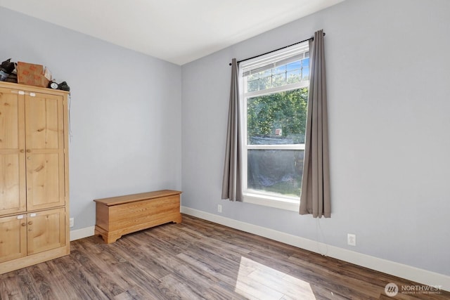 1055 Falls Dr, Bellingham, WA 98229 - spare room featuring wood finished floors and baseboards