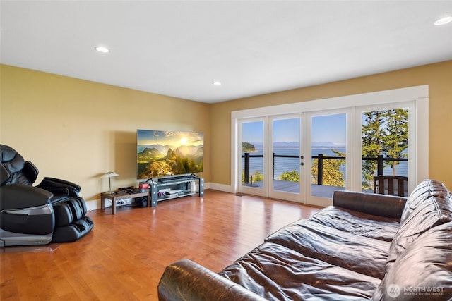 699 Lehman Dr, Camano Island, WA 98282 - living room with wood finished floors, french doors, and recessed lighting