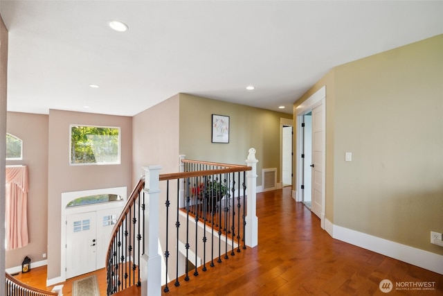 699 Lehman Dr, Camano Island, WA 98282 - hallway featuring an upstairs landing, wood finished floors, recessed lighting, and baseboards
