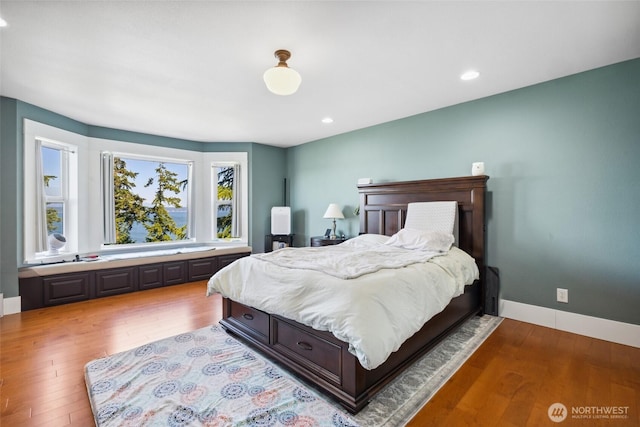 699 Lehman Dr, Camano Island, WA 98282 - bedroom with wood finished floors, baseboards, and recessed lighting