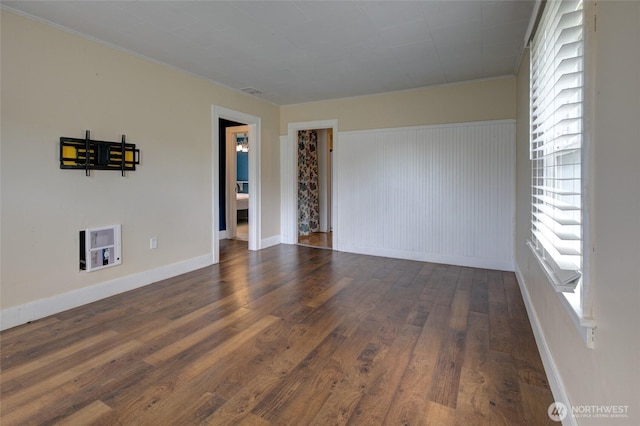 212 Hayes St, Hoquiam, WA 98550 - spare room with dark wood-style flooring, baseboards, and crown molding