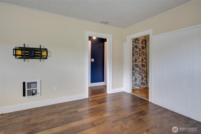 212 Hayes St, Hoquiam, WA 98550 - empty room with wood finished floors, crown molding, and baseboards