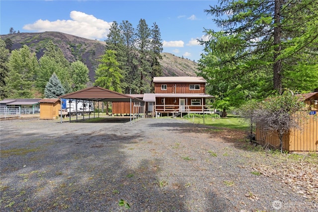 51 Deer Meadow Ln, Naches, WA 98937 - chalet / cabin with a carport, a mountain view, and driveway