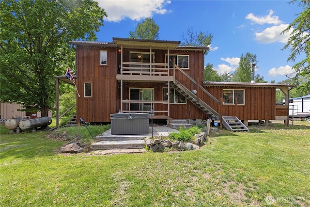 51 Deer Meadow Ln, Naches, WA 98937 - rear view of house with stairway, a hot tub, a deck, and a yard