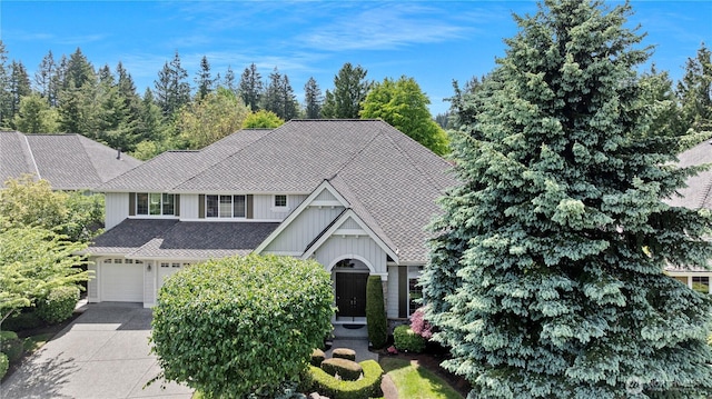 25939 SE 22nd Pl, Sammamish, WA 98075 - view of front of home with board and batten siding, a garage, and driveway