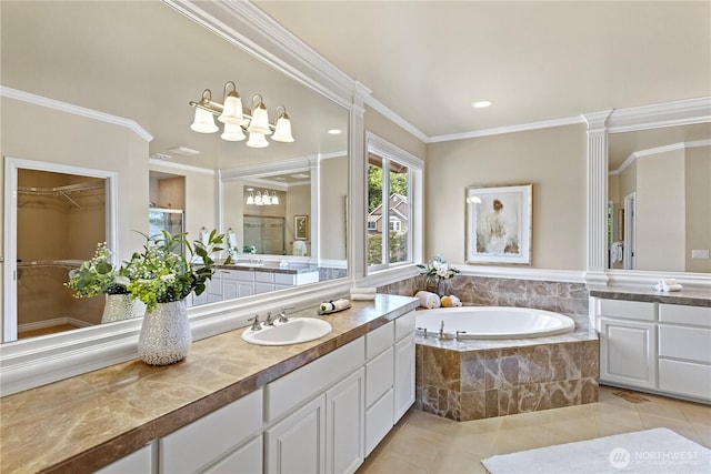 25939 SE 22nd Pl, Sammamish, WA 98075 - bathroom featuring vanity, a garden tub, tile patterned flooring, ornamental molding, and a chandelier
