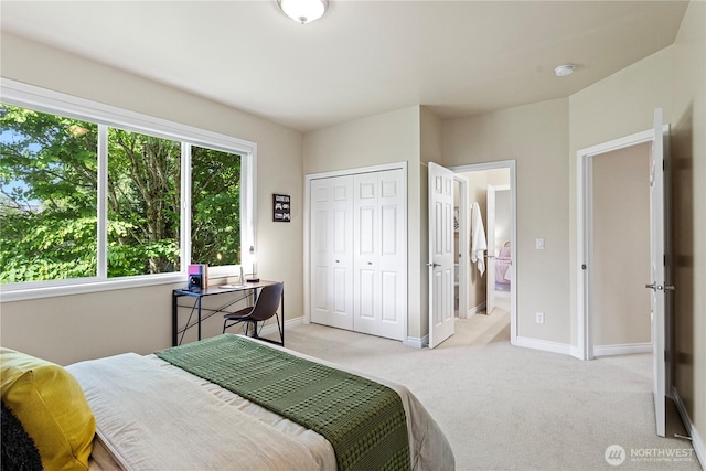 25939 SE 22nd Pl, Sammamish, WA 98075 - bedroom featuring light carpet, baseboards, and a closet