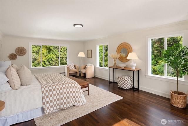 12653 Avondale Rd NE, Redmond, WA 98052 - bedroom featuring baseboards, dark wood-style flooring, and crown molding