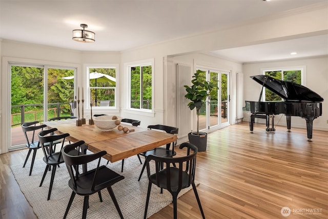 12653 Avondale Rd NE, Redmond, WA 98052 - dining space with crown molding and light wood-style floors