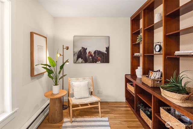 12653 Avondale Rd NE, Redmond, WA 98052 - sitting room with light wood-style floors and baseboards