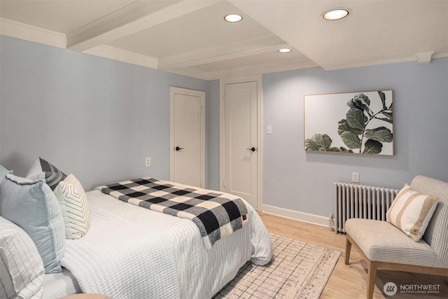 12653 Avondale Rd NE, Redmond, WA 98052 - bedroom with radiator heating unit, light wood-style flooring, recessed lighting, baseboards, and ornamental molding