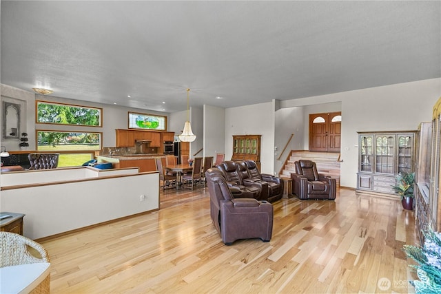 3726 SW 313th St, Federal Way, WA 98023 - living room with stairs, light wood finished floors, and recessed lighting