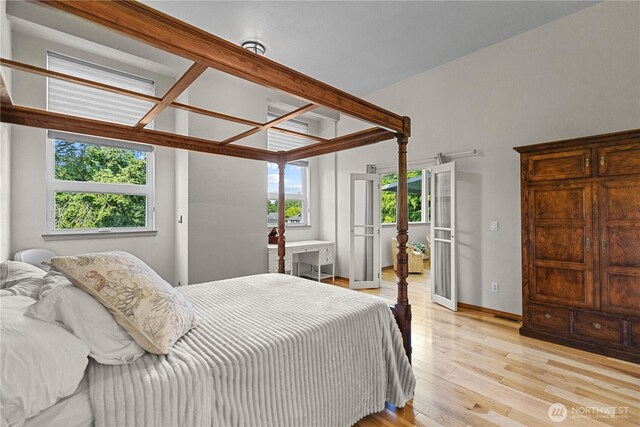 3726 SW 313th St, Federal Way, WA 98023 - bedroom with light wood finished floors, french doors, and baseboards