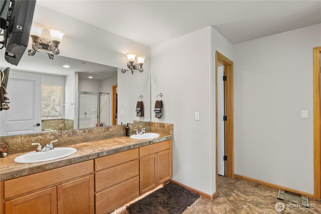 2903 96th St SE, Everett, WA 98208 - bathroom featuring a stall shower, double vanity, and baseboards