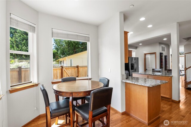 2903 96th St SE, Everett, WA 98208 - dining room featuring light wood-style floors, recessed lighting, and baseboards