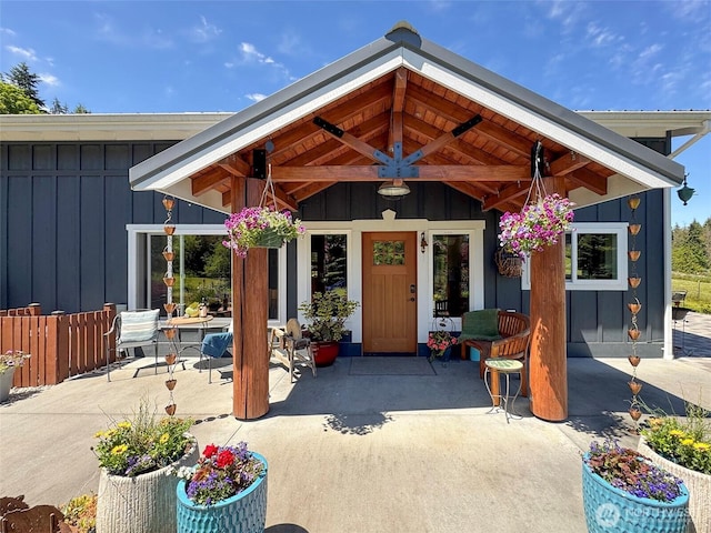 1068 Happy Valley Rd, Sequim, WA 98382 - doorway to property with board and batten siding and a patio