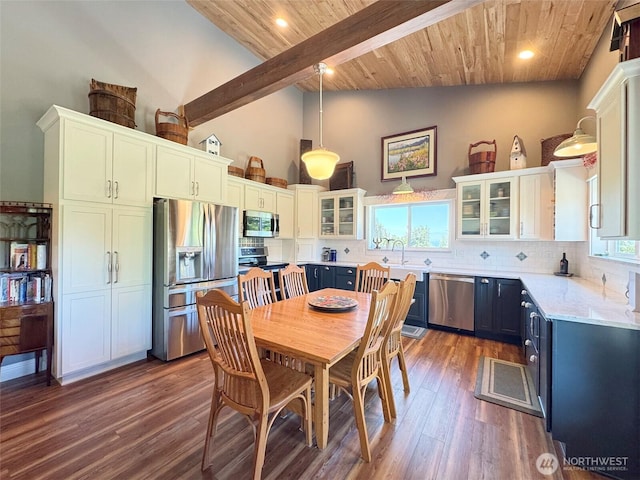 1068 Happy Valley Rd, Sequim, WA 98382 - dining area featuring high vaulted ceiling, wood finished floors, wooden ceiling with exposed beams, and recessed lighting