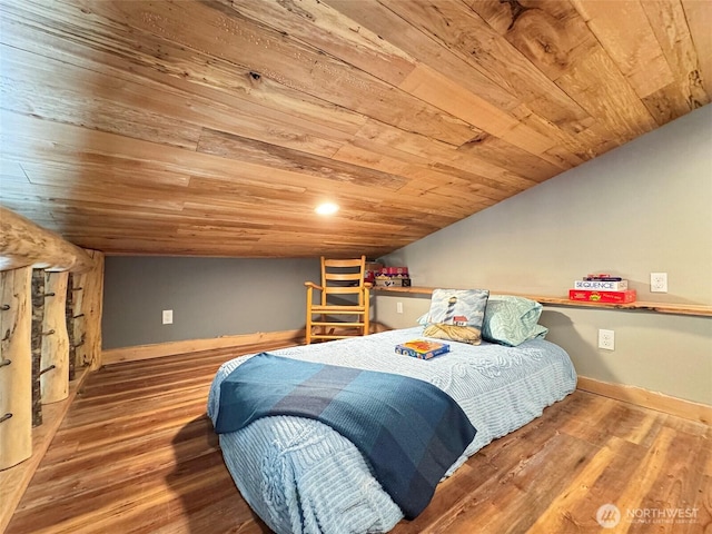 1068 Happy Valley Rd, Sequim, WA 98382 - bedroom featuring wooden ceiling, vaulted ceiling, wood finished floors, and baseboards