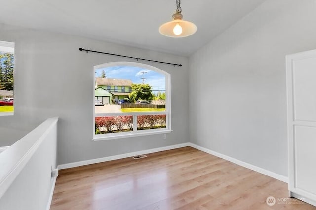 10903 Paine Field Way, Everett, WA 98204 - empty room with plenty of natural light, wood finished floors, and baseboards