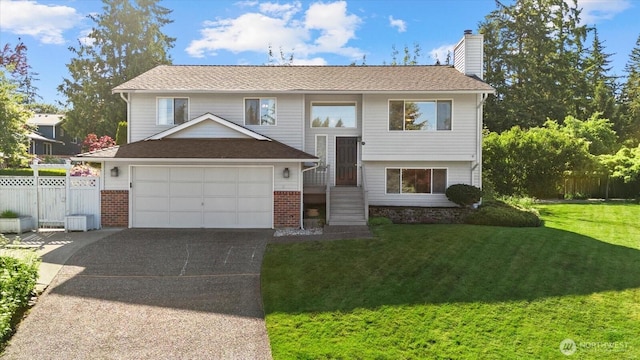 9 199th Pl SE, Bothell, WA 98012 - split foyer home with driveway, a chimney, a garage, and brick siding
