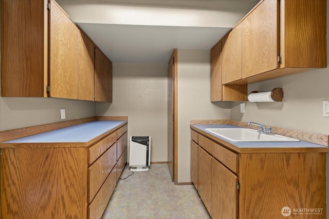 9 199th Pl SE, Bothell, WA 98012 - kitchen with a sink, light countertops, light flooring, and baseboards