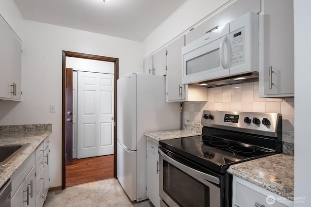 310 S 11th St Unit 106, Mount Vernon, WA 98274 - kitchen with stainless steel appliances and tasteful backsplash