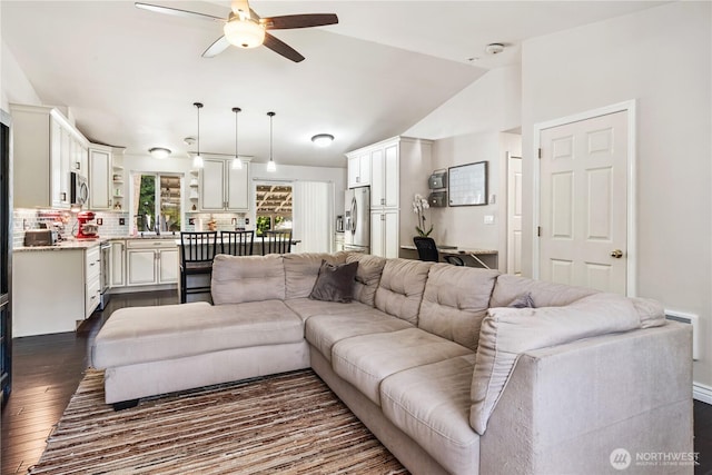 7606 Illahee Rd NE, Bremerton, WA 98311 - living room featuring a ceiling fan, dark wood finished floors, and vaulted ceiling