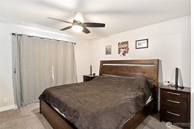 7606 Illahee Rd NE, Bremerton, WA 98311 - bedroom with light colored carpet and a ceiling fan