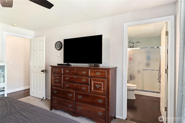 7606 Illahee Rd NE, Bremerton, WA 98311 - bedroom with baseboards, ensuite bath, and a ceiling fan