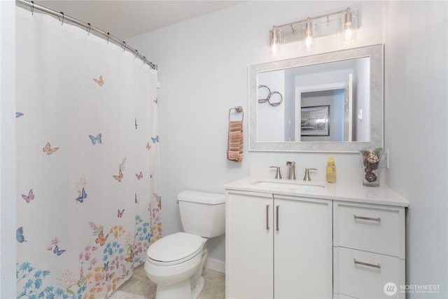 7606 Illahee Rd NE, Bremerton, WA 98311 - bathroom featuring vanity, toilet, tile patterned floors, a shower with shower curtain, and baseboards