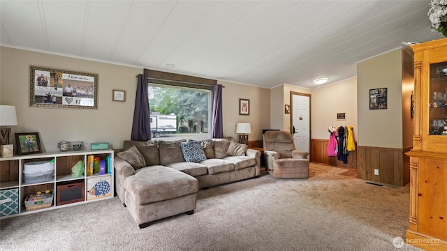 311 W Clay, Dayton, WA 99328 - carpeted living area featuring crown molding, a wainscoted wall, and wooden walls