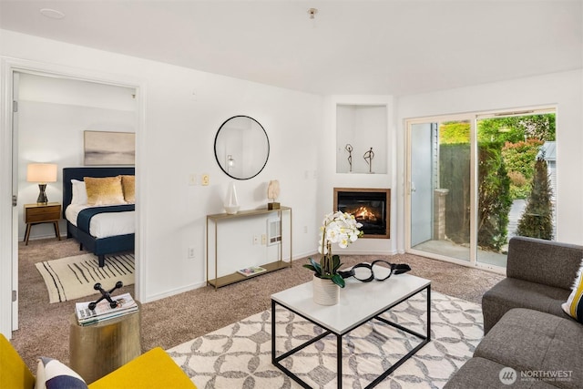 18621 Blueberry Ln Unit A104, Monroe, WA 98272 - living room featuring carpet flooring and a glass covered fireplace