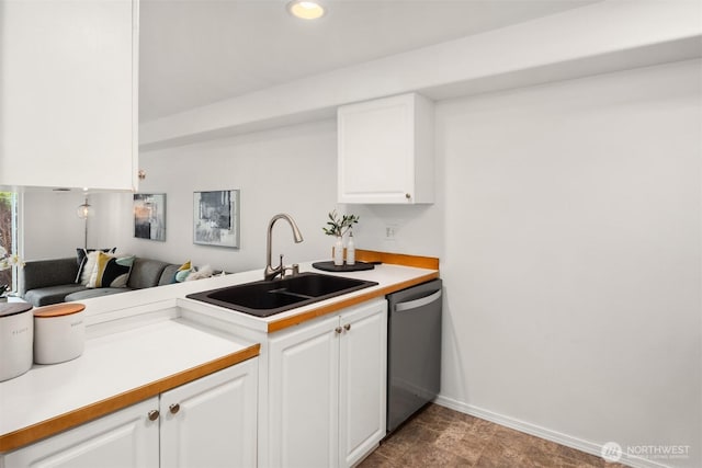 18621 Blueberry Ln Unit A104, Monroe, WA 98272 - kitchen featuring stainless steel dishwasher, white cabinets, light countertops, recessed lighting, and a peninsula