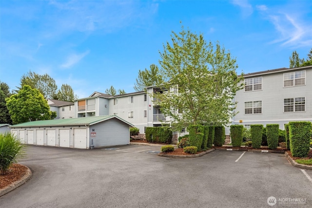 18621 Blueberry Ln Unit A104, Monroe, WA 98272 - view of property with uncovered parking and a residential view