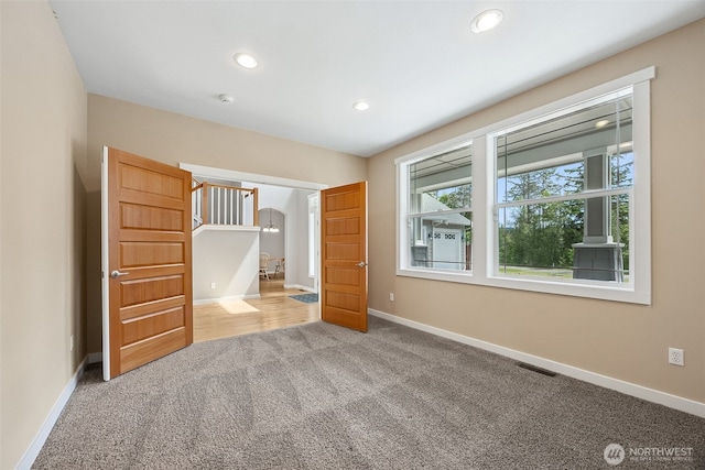 13123 320th Street Ct E, Graham, WA 98338 - unfurnished bedroom with carpet floors, baseboards, and recessed lighting