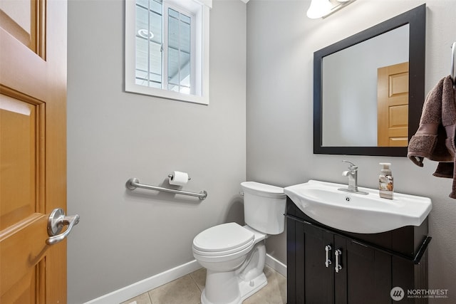 13123 320th Street Ct E, Graham, WA 98338 - half bath with vanity, toilet, tile patterned flooring, and baseboards