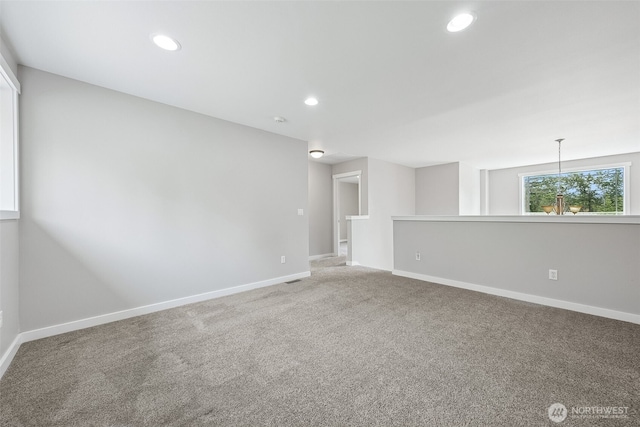 13123 320th Street Ct E, Graham, WA 98338 - spare room featuring carpet, recessed lighting, and baseboards