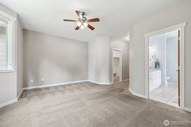 13123 320th Street Ct E, Graham, WA 98338 - unfurnished room with a ceiling fan, light colored carpet, baseboards, and light tile patterned floors