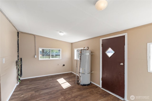 1109 River St, Hoquiam, WA 98550 - entrance foyer featuring strapped water heater, wood finished floors, and baseboards