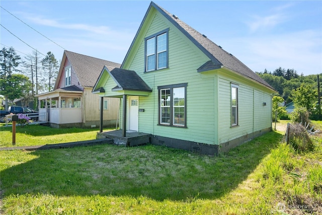 1109 River St, Hoquiam, WA 98550 - rear view of house featuring crawl space, a lawn, and roof with shingles