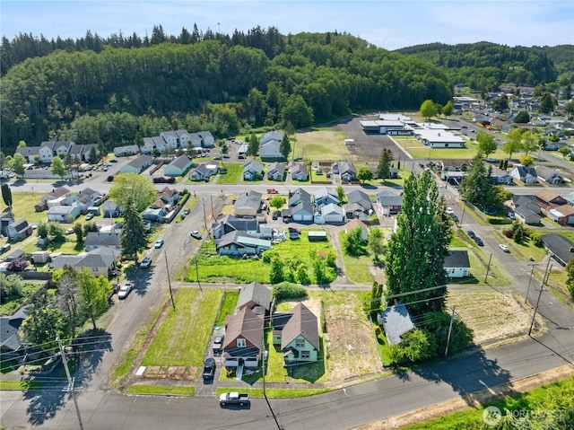 1109 River St, Hoquiam, WA 98550 - view of property location featuring nearby suburban area and a heavily wooded area