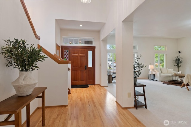 2433 18th St SE, Puyallup, WA 98374 - foyer entrance with light wood-style floors and baseboards