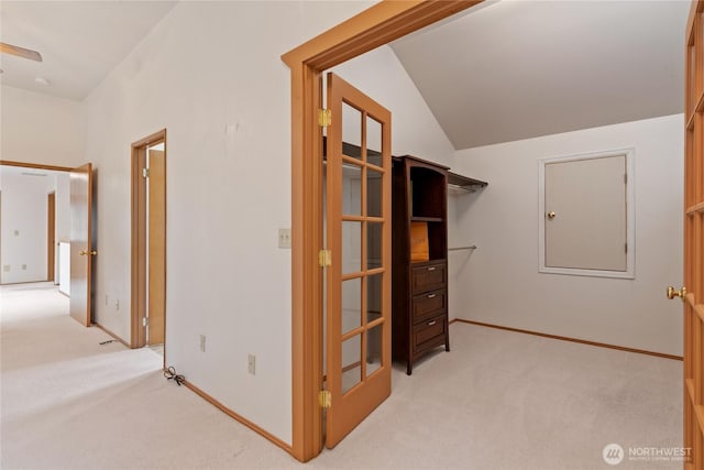 2433 18th St SE, Puyallup, WA 98374 - spacious closet with light colored carpet and vaulted ceiling